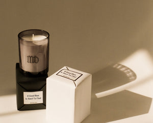 Luxury scented candle with musk leather fig notes