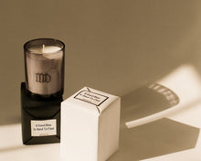 Load image into Gallery viewer, Luxury scented candle with musk leather fig notes
